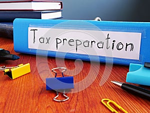 Tax preparation is shown on the business photo using the text photo