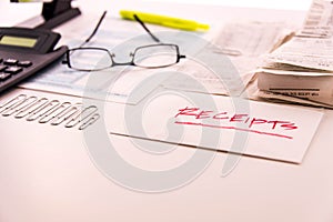 Tax preparation supplies, reading glasses and tax forms