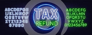 Tax refund neon sign on dark background.