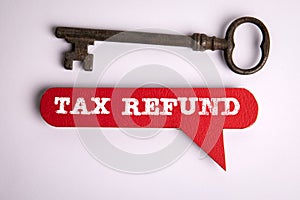 Tax Refund. Speech bubble with text and key on white background