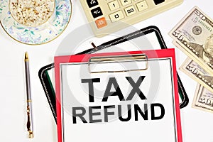 Tax refund. Text labels on the accounting folder of documents