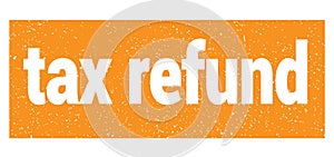 Tax refund text written on orange stamp sign