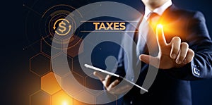 Tax report taxes payment business finance concept. Businessman pointing on virtual screen.