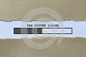 tax return loaded on white paper