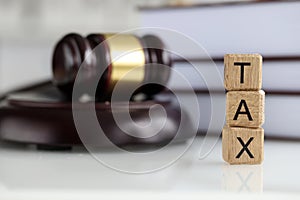 Tax word collected of wooden blocks letters, tax-filling