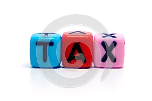 Tax word from letter beads on the white background