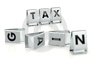 TAX word written on glossy blocks and fallen over blurry blocks with GAIN letters. Isolated on white. High taxes reduces companies