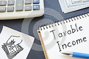 Taxable Income is shown on the conceptual business photo using the text photo