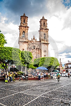 Taxco, Mexico - October 29, 2018. Main cathedral of Santa Prisca and main square in Taxco