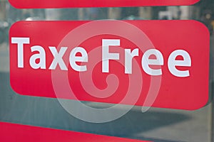 Taxe free text duty free shop sign stickers windows store on facade boutique