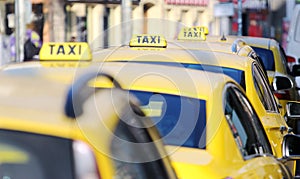 Taxi cab standing on the airport waiting stand