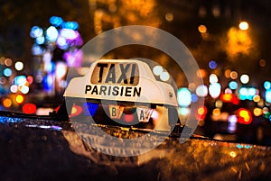 Taxi Cabs at the Champs Elysees in Paris, France photo