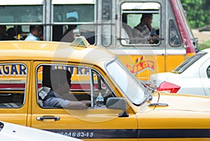 Taxi driver in the car