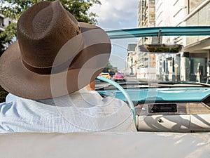 Taxi driver in a classic american car in Havana, Cuba