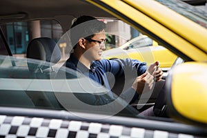 Taxi driver driving car happy counting money