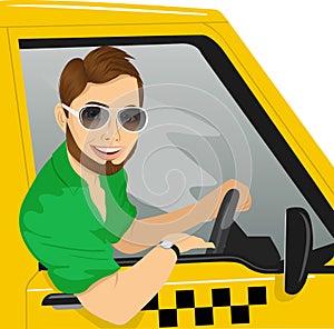 Taxi driver with sunglasses in yellow car smiling
