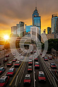 Taxi and Hongkong city with morning sunrise