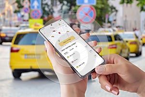 Taxi mobile app with smart maps and order button photo