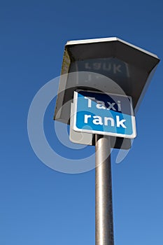 Taxi Rank sign on a tall metal pole