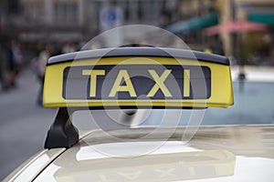 Taxi sign of a cab in Munich, Germany, 2015