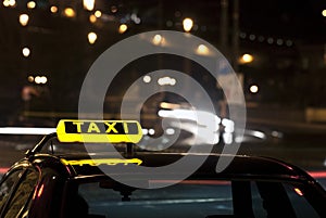 Taxi sign at night