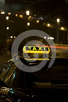 Taxi sign at night