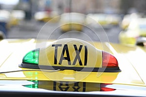 Taxi sign with red and green lights