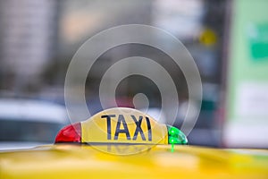 Taxi sign with red and green lights