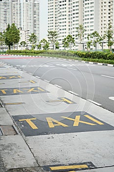 taxi stand sign on a road in singapore