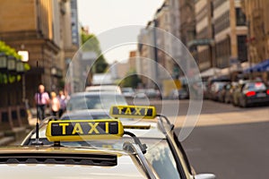 Taxi waiting in front of another one