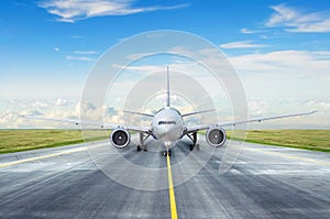 Taxiing passenger commercial airplane to the runway photo