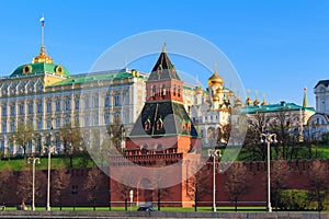 Taynitskaya tower closeup on the background of Moscow Kremlin buildings