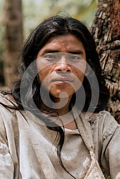 Tayrona, Santa Marta, Colombia - March 09 2021: portrait of an Kogi indigenous man, Kogi men in the Parque Natural Tayrona,
