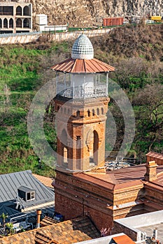Tbilisi, Georgia - 03 April, 2021: Minaret of Jumah Mosque in Abanotubani area photo