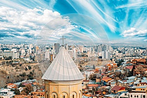 Tbilisi, Georgia. cityscape skyline, Scenic View altered sky. Georgian Capital Skyline Cityscape. St Nikolas Church