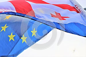 Tbilisi, Georgia. Close up of a Georgian flag with an European Union flag.