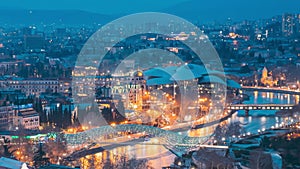 Tbilisi, Georgia. Day To Night timelapse Transition. Scenic View Of Justice house, bridge of peace. Elevated Top View Of