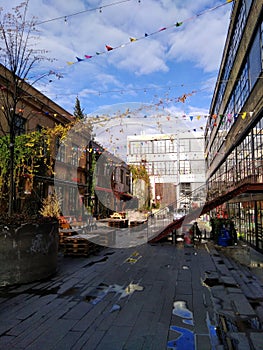 TBILISI, GEORGIA - December 8 2018: The modern design of the courtyard of the urban art zone Fabrika with graffiti photo