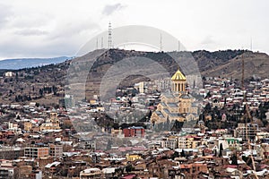 TBILISI, GEORGIA - January 08, 2023: Beautiful top view landscape of Tbilisi Georgia. Sight-seeing the Holy Trinity Chruch the