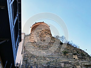 TBILISI, GEORGIA - JULY 16 2018: The old district of the city `Narikala` Fortress in Tbilisi, Georgia