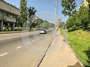 TBILISI, GEORGIA - - MAY 17, 2018: View of the old building. Cars on the road. Springtime in city.