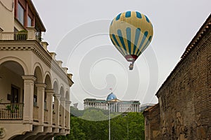 Tbilisi, Georgia. Old town architecture and hot air balloon