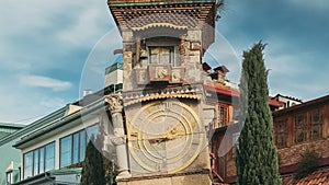 Tbilisi, Georgia. People Walking Near Famous Rezo Gabriadze Marionette Theater Clock Tower On Old City. Puppet Theater