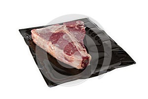 TBone steak in vacuum package photo
