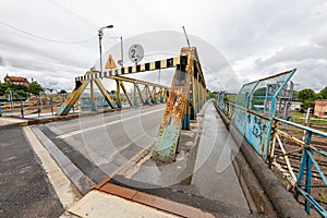 Tczew, pomorskie / Poland â€“ July, 16, 2020: Road bridge over the railway line. Old steel riveted structure