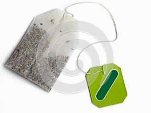 Tea bag with blank green label