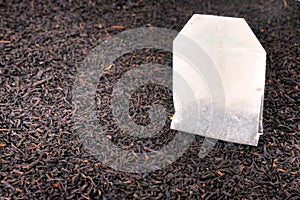 Tea bag and dried tea leaves