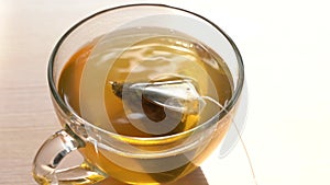 Tea Bag in a Tea Cup. Brew Green Tea in a Mug