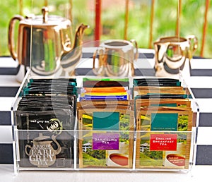 Tea Bags in Clear Acrylic Tea Bag Holder with Silverware Pot Set photo