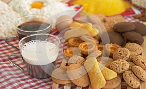 Tea, biscuits, milk, egg